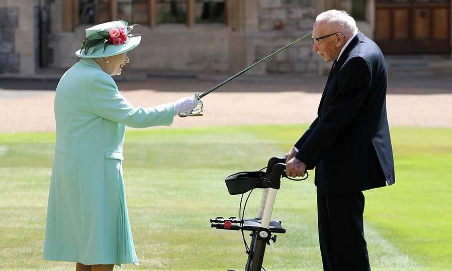 The Queen knights Captain Sir Tom at Windsor Castle