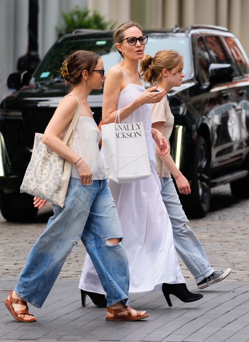 Angelina Jolie, her daughter Vivienne, and a friend