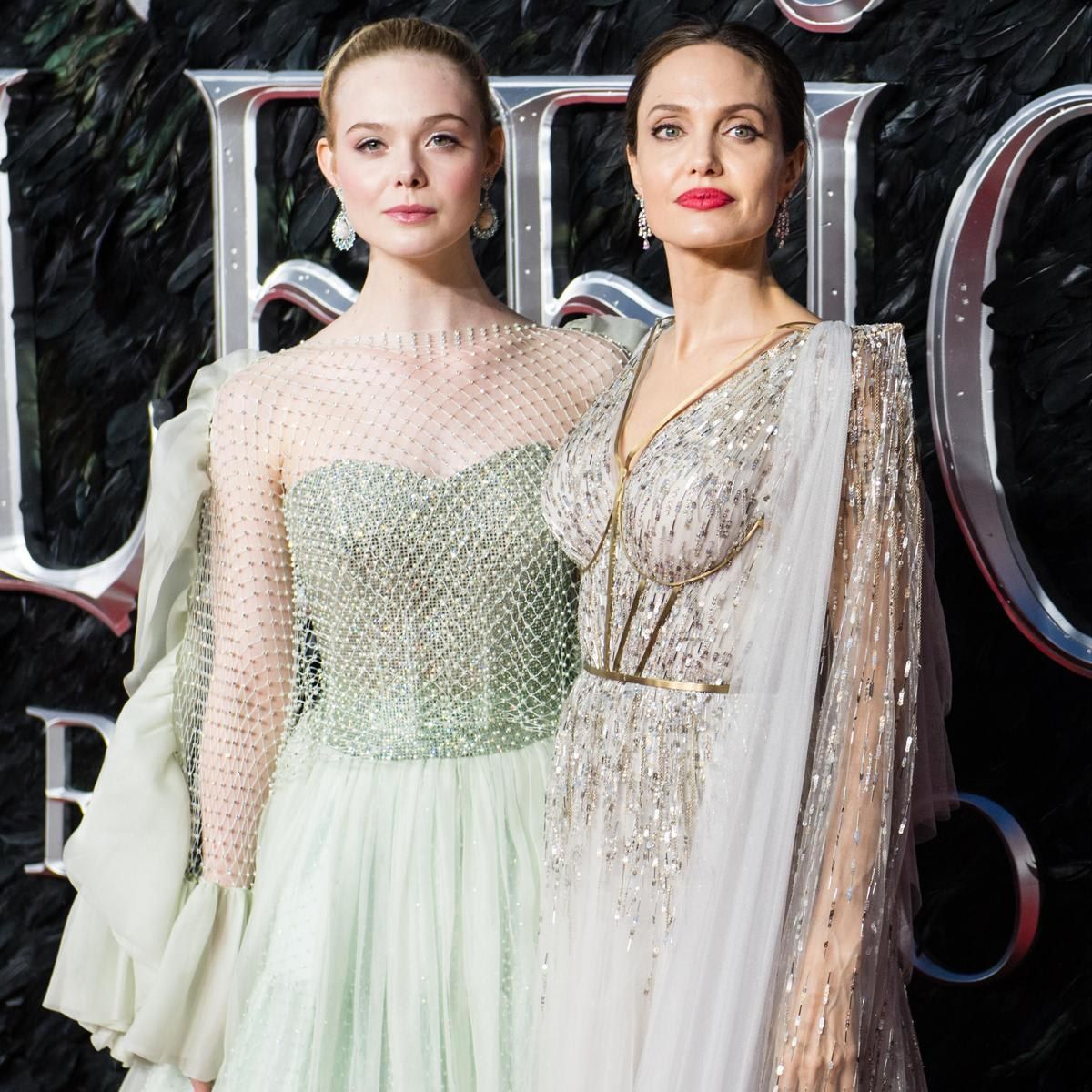 The onscreen mother-daughter duo, Angelina Jolie and Elle Fanning, looked regal entering the red carpet premiere of 'Maleficent: Mistress Of Evil,' taking inspiration from the movie and channeling the enchanted forest kingdom with Elle's Armani Prive gown and Angelina's couture dress designed by Ralph & Russo.