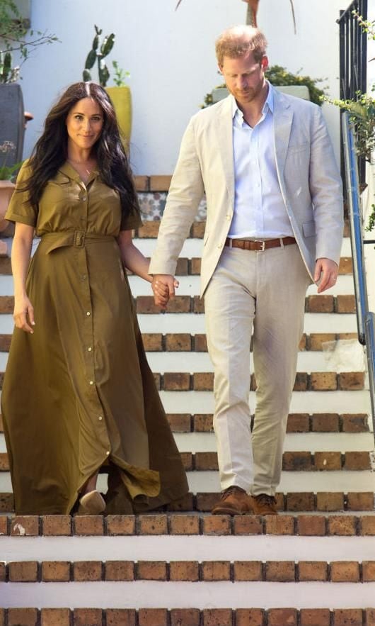 Meghan Markle with a maxi shirt dress in olive green from Staud.