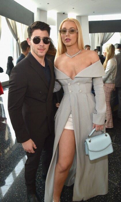 Throwin' shade! Nick Jonas and Iggy Azalea caught up at the Roc Nation event. The music stars kept their shades on as they mingled at the brunch, both wearing double breasted ensembles. The 25-year-old singer and actor wore a brown suit, while the 27-year-old rapper chose a grey suit-dress.
Photo: Getty Images