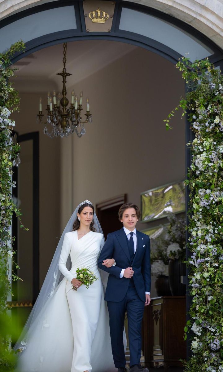 The royal bride (pictured with her brother in law Prince Hashem) wore an Elie Saab gown