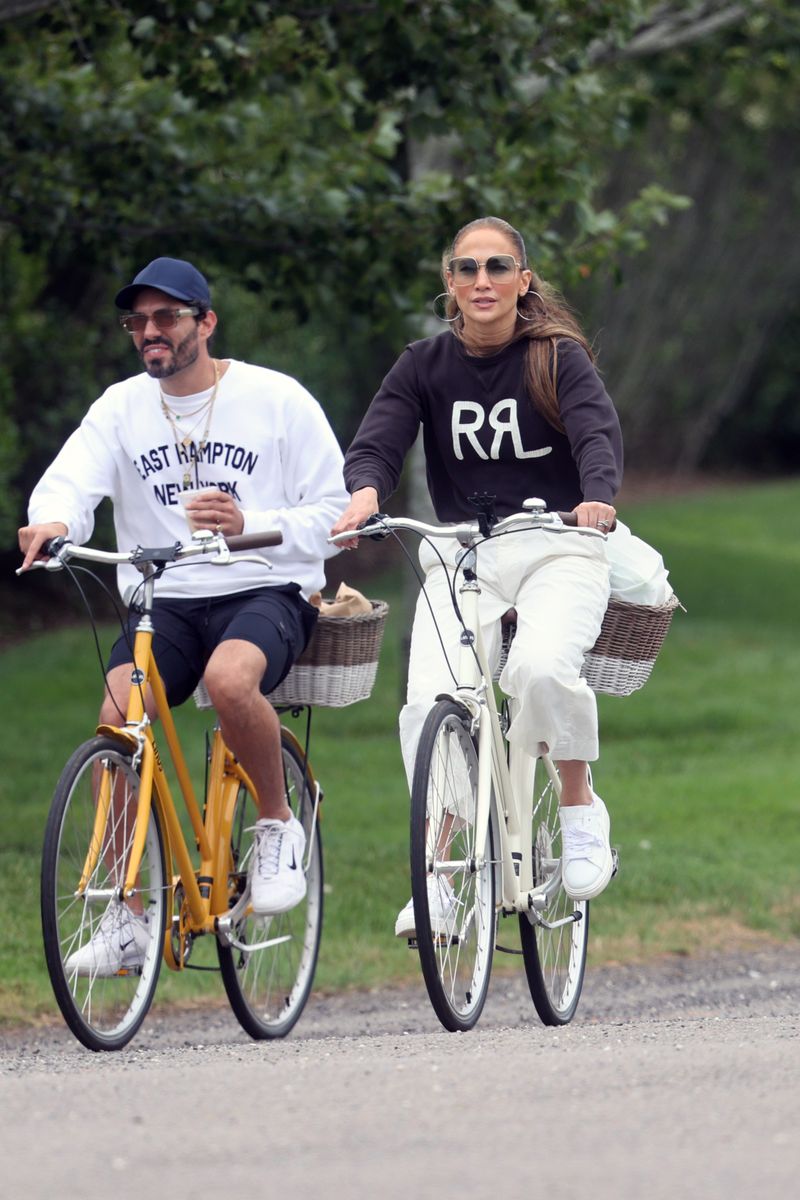 Jennifer Lopez goes out for a bike ride with friends in the Hamptons an hour after a Fire Chief from the Southhampton Fire Department was spotted leaving her house.