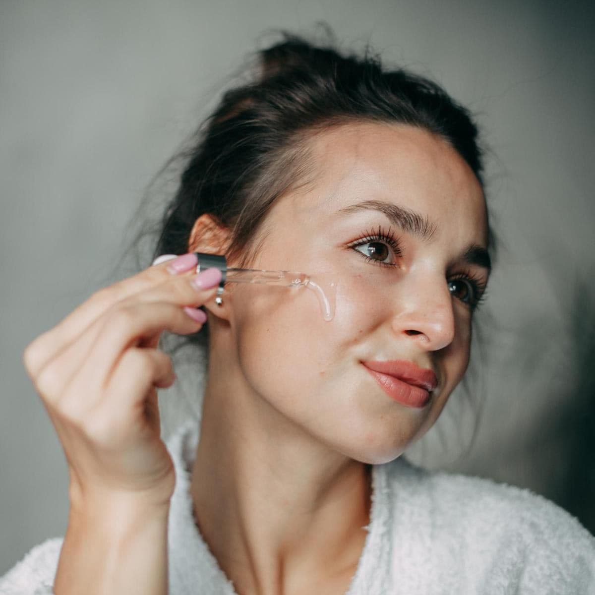 woman applying collagen