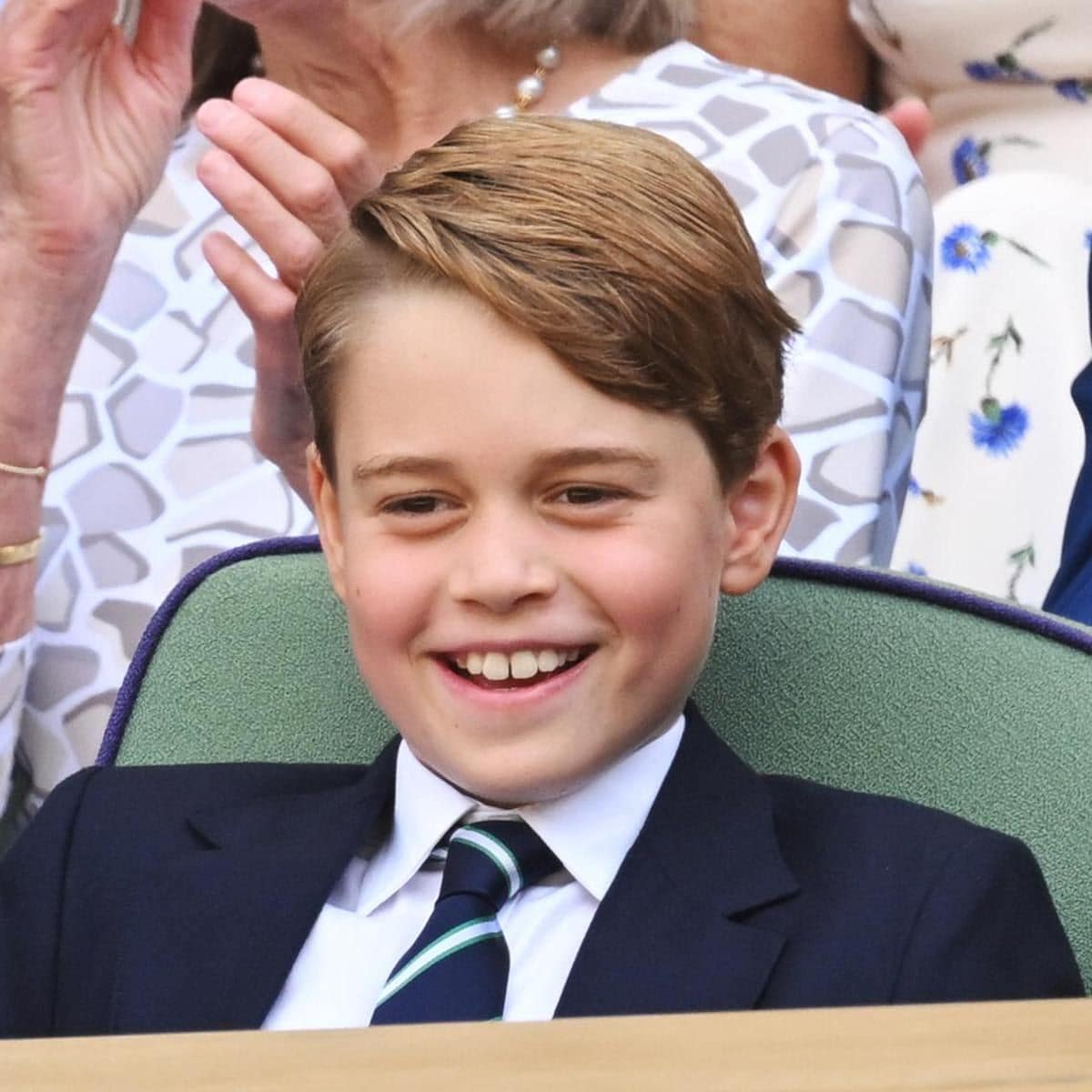 Prince George smiles at the beach in new birthday photo