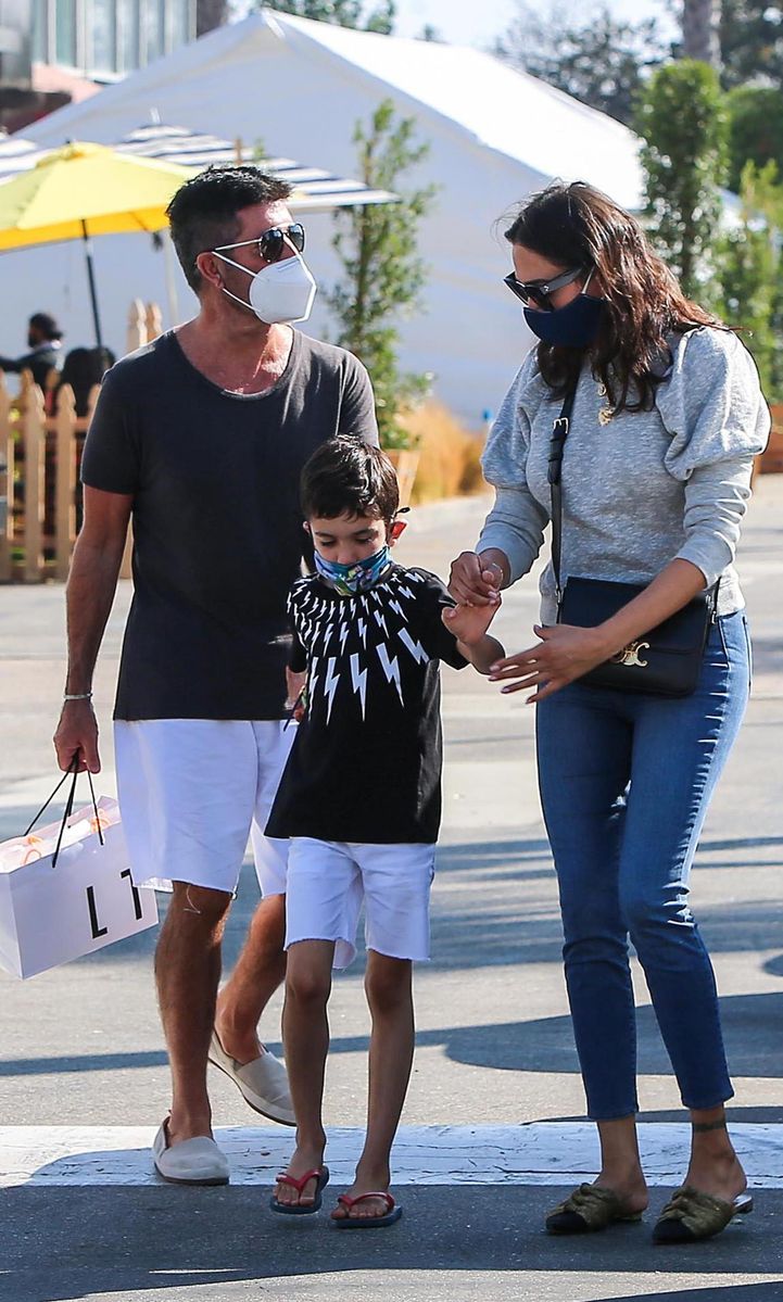 Simon Cowell steps out with his Lauren Silverman, 43, and their six year old son Eric on Sunday afternoon in Malibu.