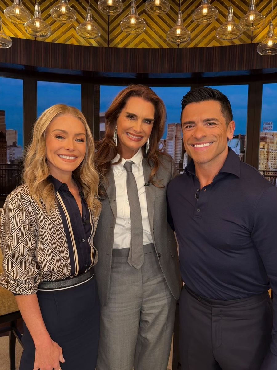 Kelly Ripa and Mark Consuelos pose with Brooke Shields