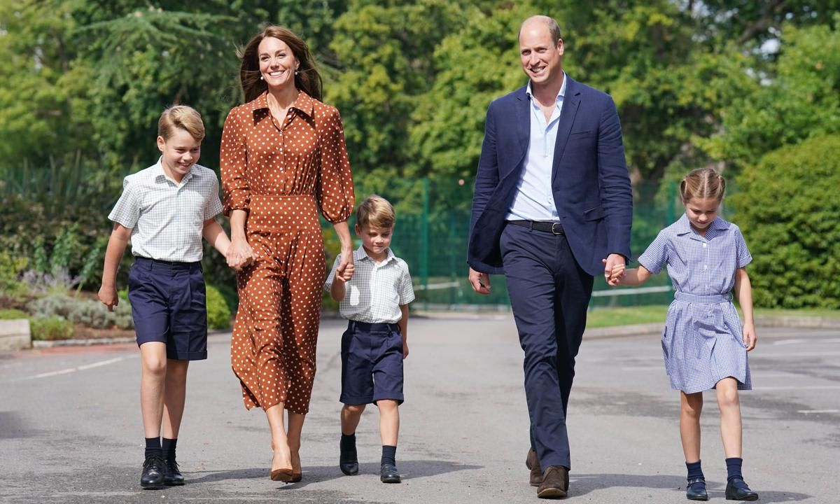 The proud parents accompanied their kids.