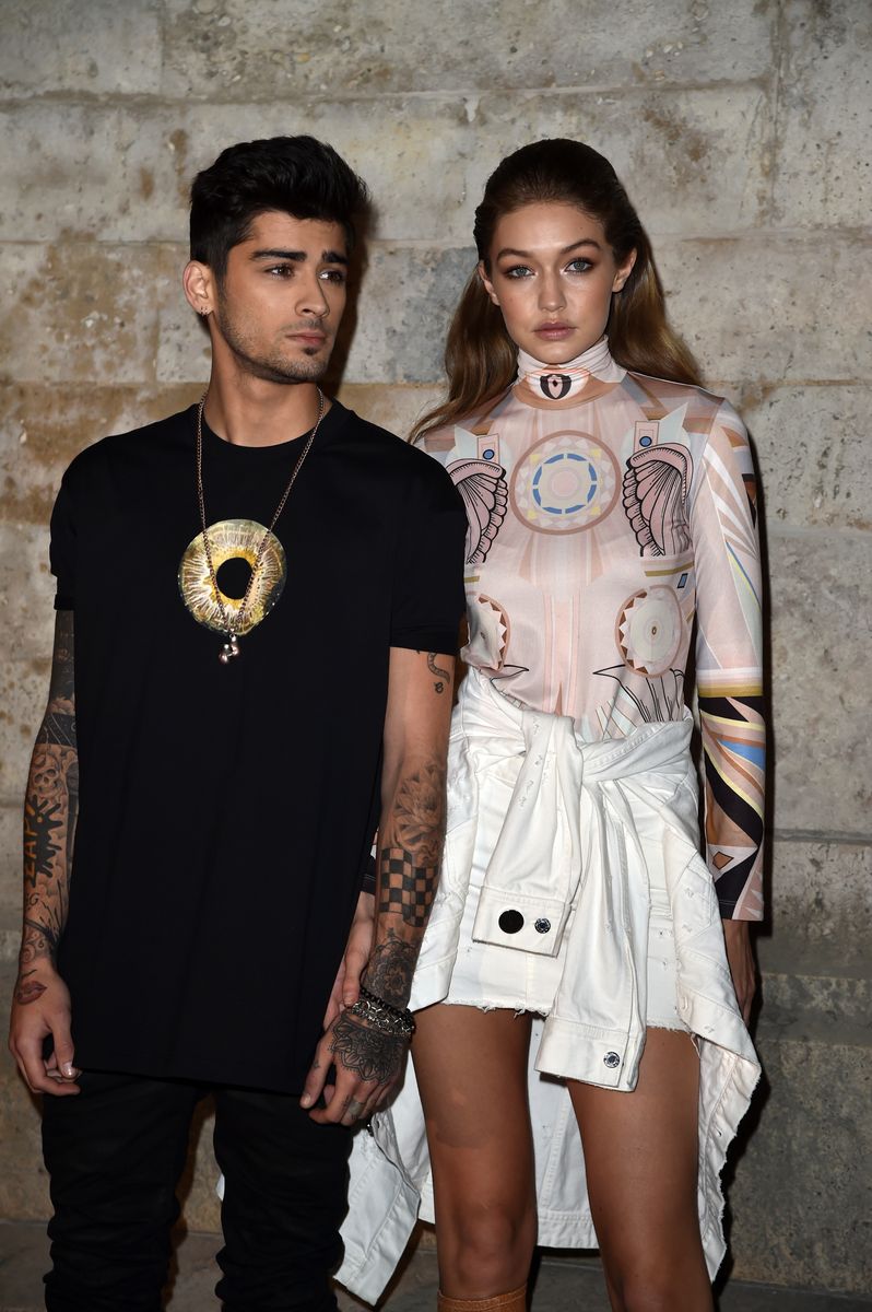 Zayn Malik and Gigi Hadid attend the Givenchy show as part of the Paris Fashion Week 