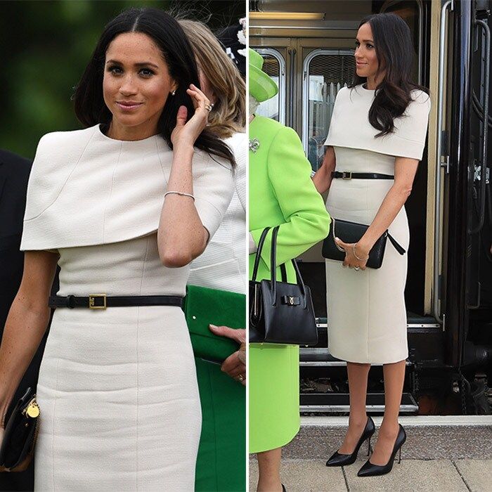 Newlywed Meghan opted for a tailored cream cape dress by her wedding gown creator Givenchy as she joined Queen Elizabeth for their first-ever joint engagement as a pair on June 14 in Cheshire, England. The chic look, which fits right in to the Duchess of Sussex's famous minimalist style, was cinched at the waist with a black belt, and Meghan accessorised with a black handbag and stiletto heels.
Photo: Getty Images