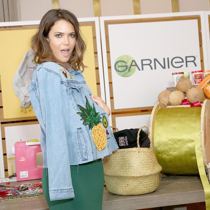 Mandy Moore hosted the ultimate girls' night with Garnier in West Hollywood where she made this custom denim jacket perfect for the warm weather.
Photo: Getty Images