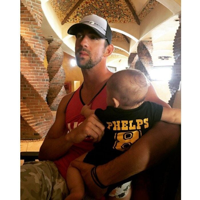 Saturdays are for sports in the Phelps household. Michael shared a photo of himself and Boomer (sporting a personalized jersey) enjoying quality father-son time together. Attached to the image, the proud dad wrote, "#saturdaysarefortheboys time for some golf and football!! #goblue #boomertravels."
Photo: Instagram/@boomerrphelps