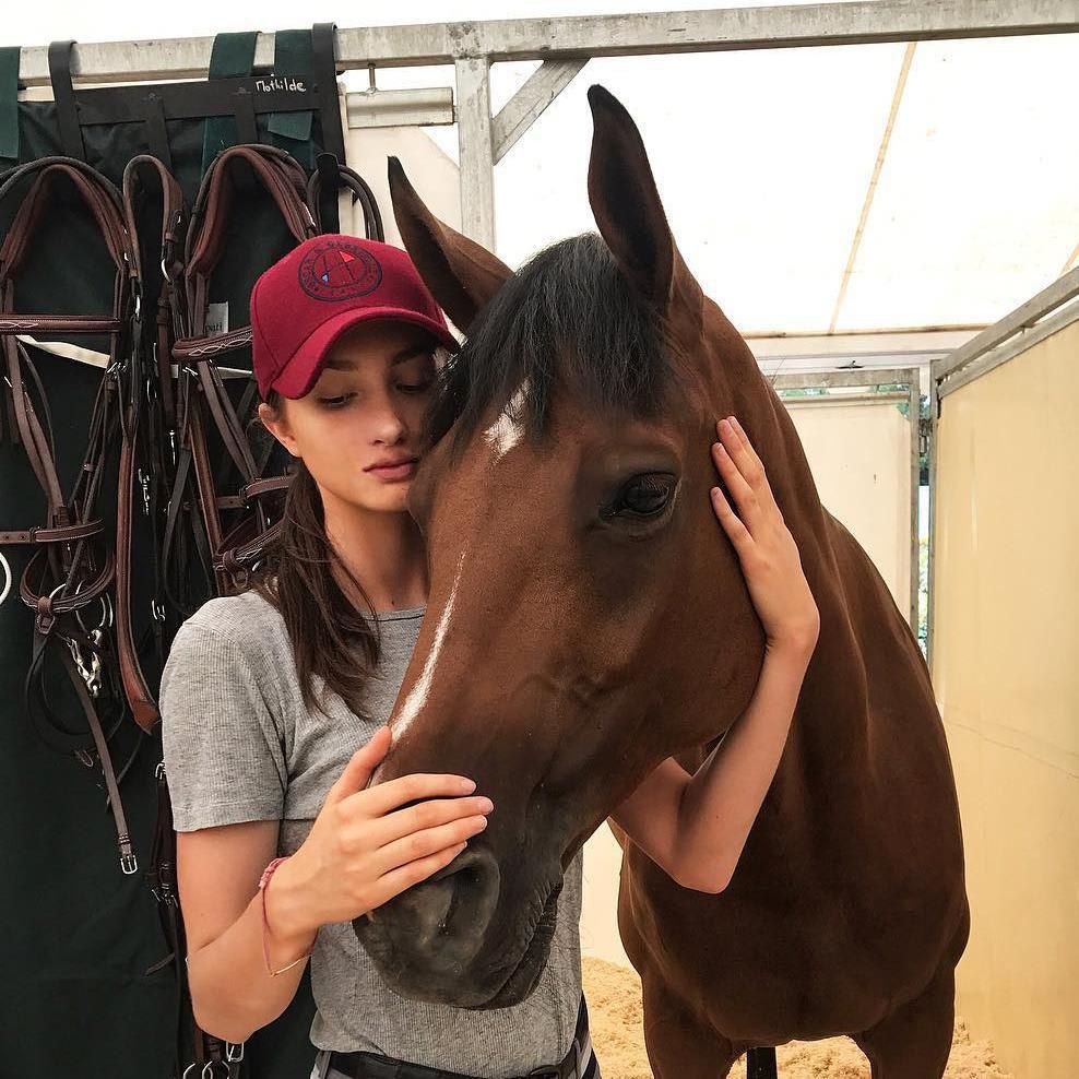 Valentina Paloma's stepsister Mathilde Pinault with a horse