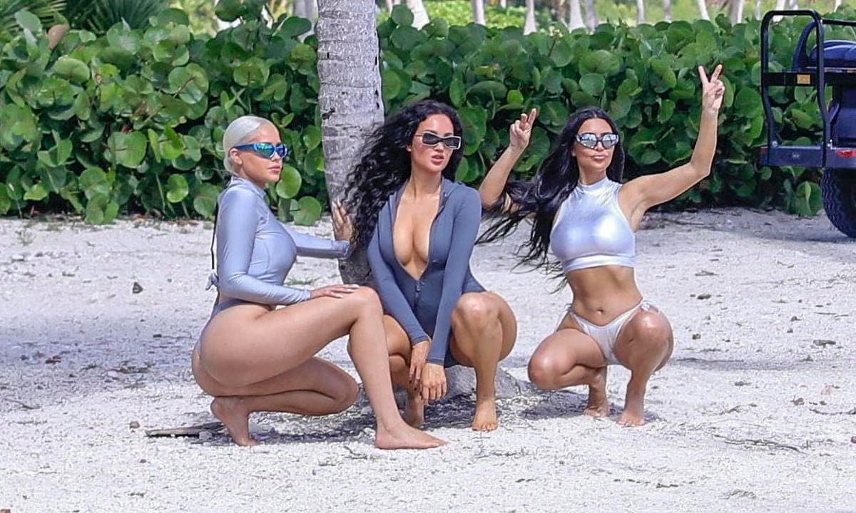 Kim Kardashian Poses in a Silver Bikini to Promote her New SKIMS swimsuit line