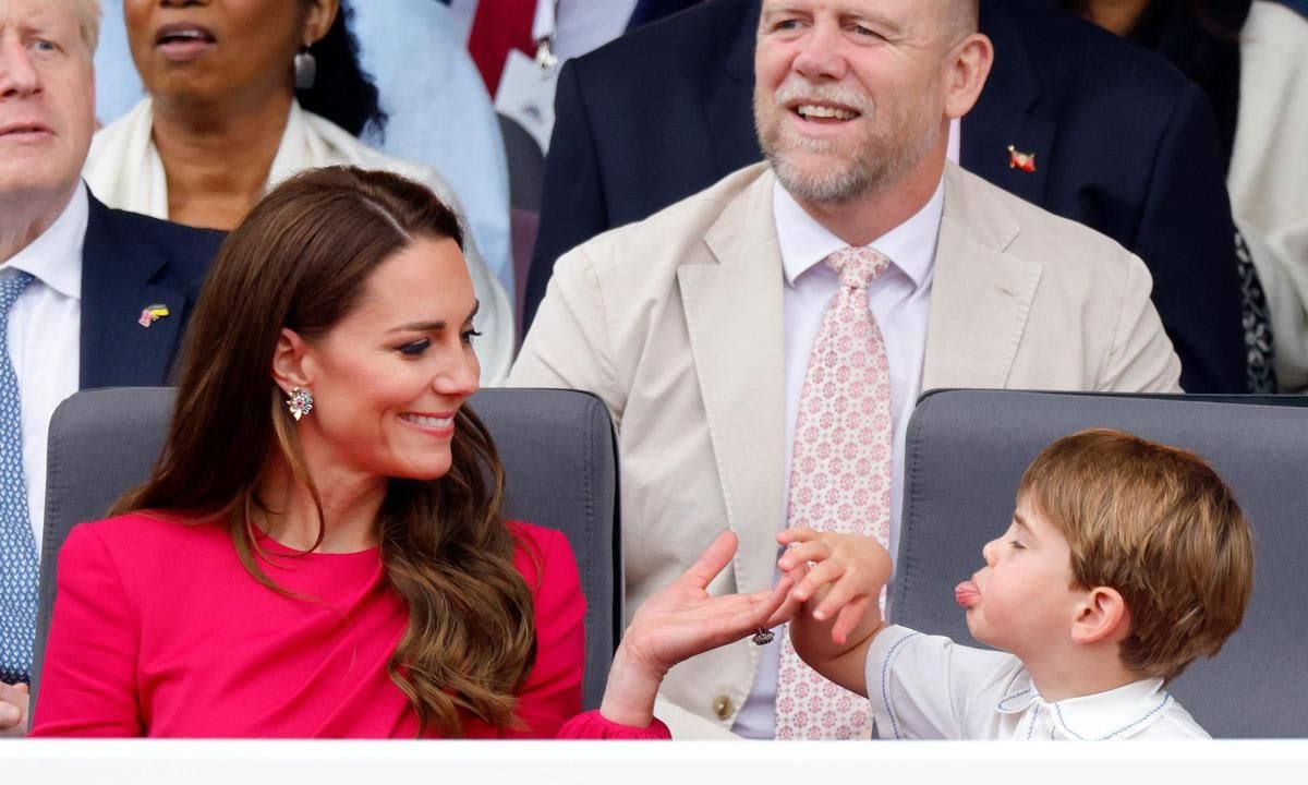 The Duchess smiled at her son as he stuck out his tongue.