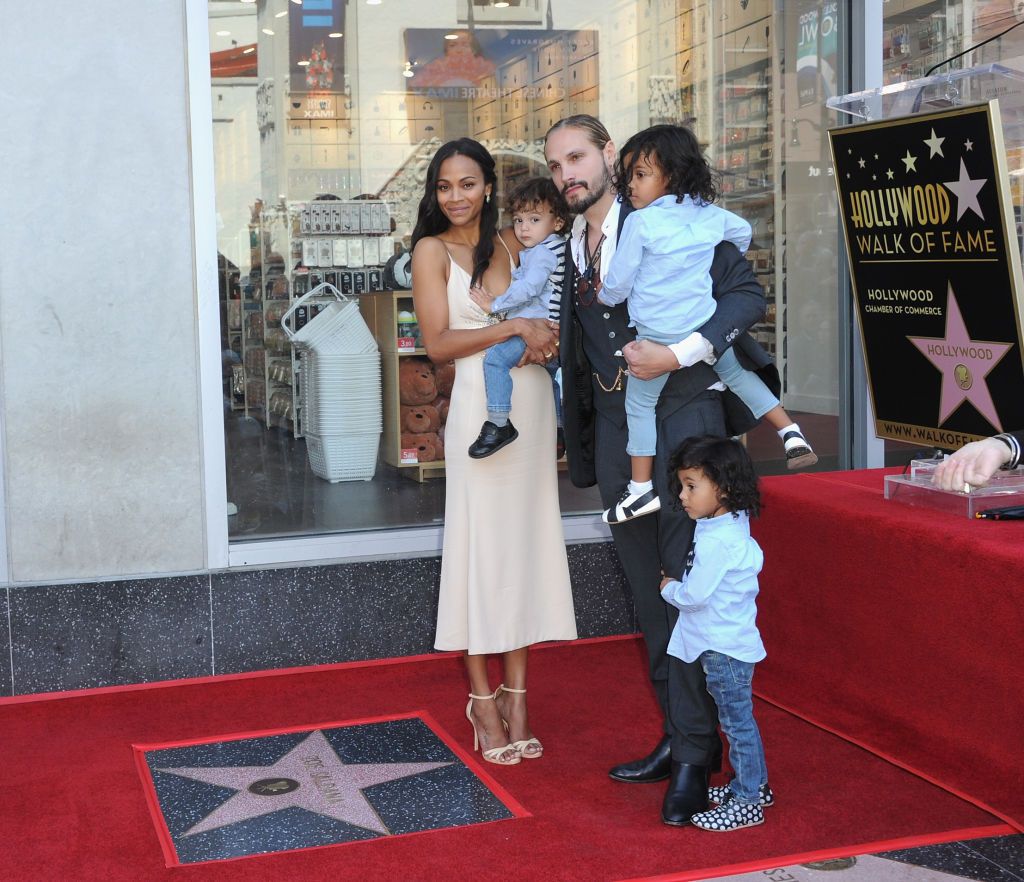 Zoe Saldana, husband Marco Perego, and their children attend Saldana's star ceremony on The Hollywood Walk Of Fame on May 3, 2018 in Hollywood, California.