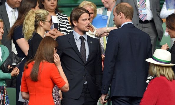 Talking about fatherhood? Prince William and Josh chat in the stands.
Photo: Getty Images