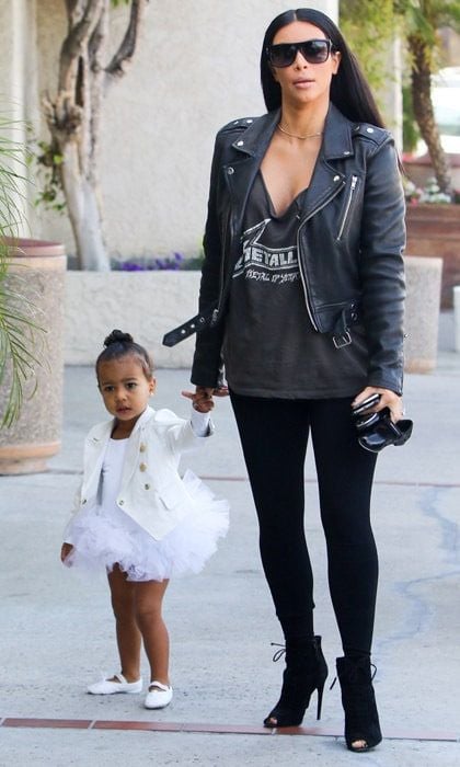 <b>May 2015</b>
<br>
Mommy's little ballerina! North is the epitome of style in this Balmain jacket and tutu after a round of ballet practice.
</br><br>
Photo: Getty Images