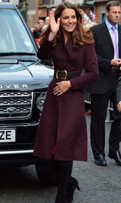 It seems Kate has taken a liking to Alexander McQueen coats! Here's another picture of the Duchess wearing a coat, this time in deep purple.
<br>
Photo: Getty Images