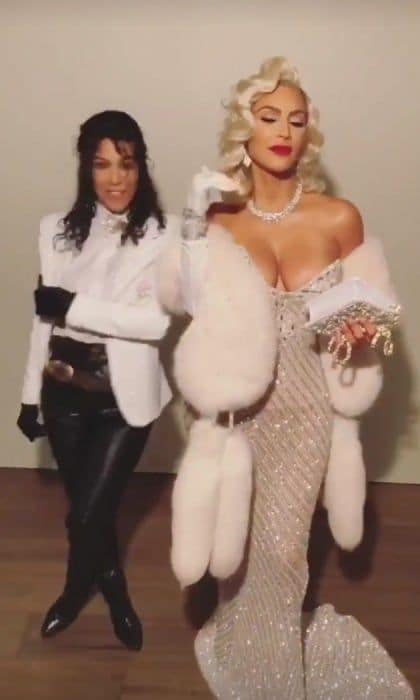 Reality TV royalty took on music royalty when Kim Kardashian and her older sister Kourtney channeled Madonna and Michael Jackson for their Halloween costumes on Saturday, October 28. Using a famous Academy Awards appearance of the duo for their inspiration, Kourtney dressed as the late Michael Jackson while Kim took on Madonna. The sisters shared lots of videos of their holday look on their social media platforms. "My Halloween theme this year is ICONS! Musical legends!!! Paying homage to some of my faves!," Kim tweeted that night. She dressed as Cher the night before.
Photo: Twitter/@KimKardashian