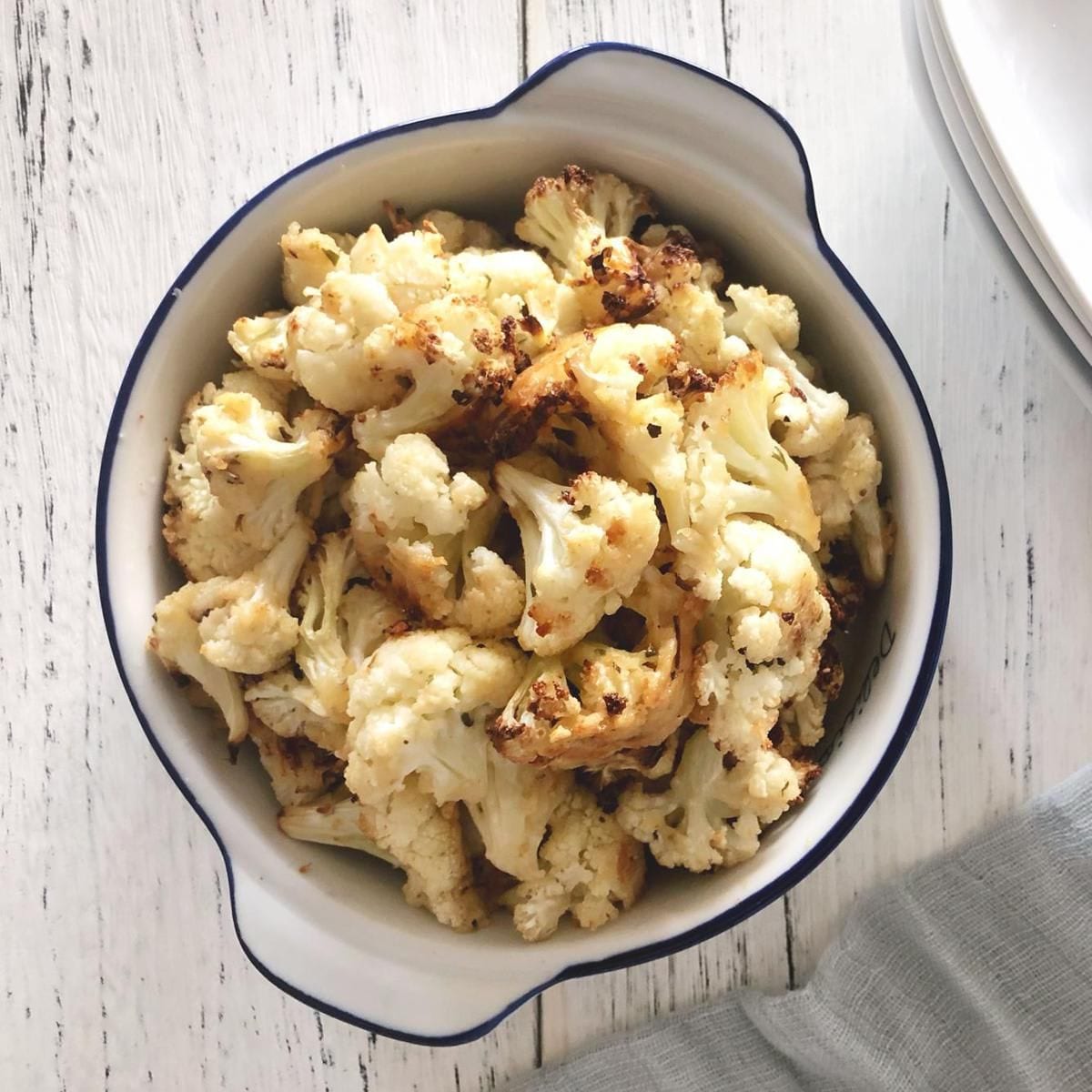 Close-up of a plate of home-cook parmesan cheese roasted cauliflower