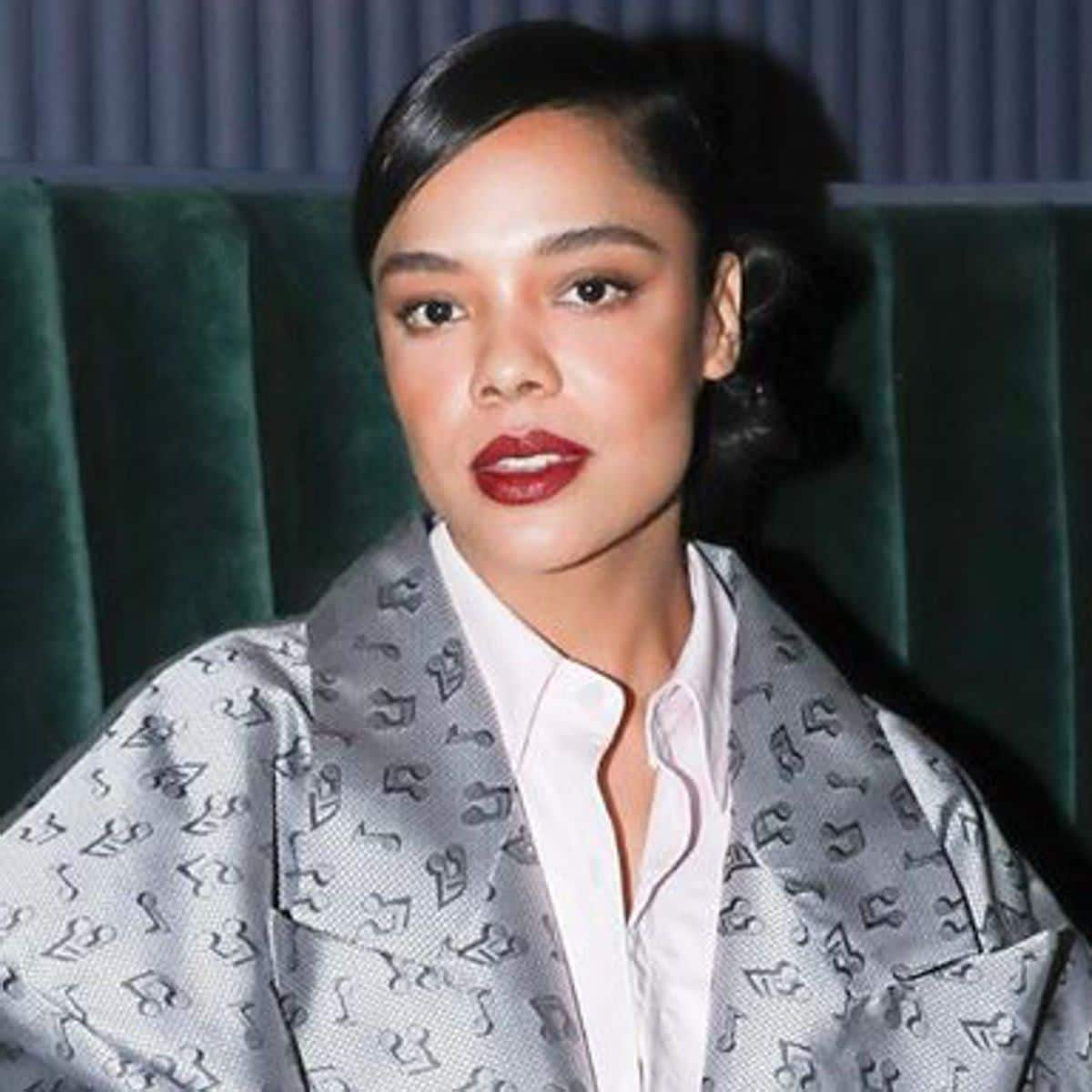 Tessa Thompson hair side part low bun