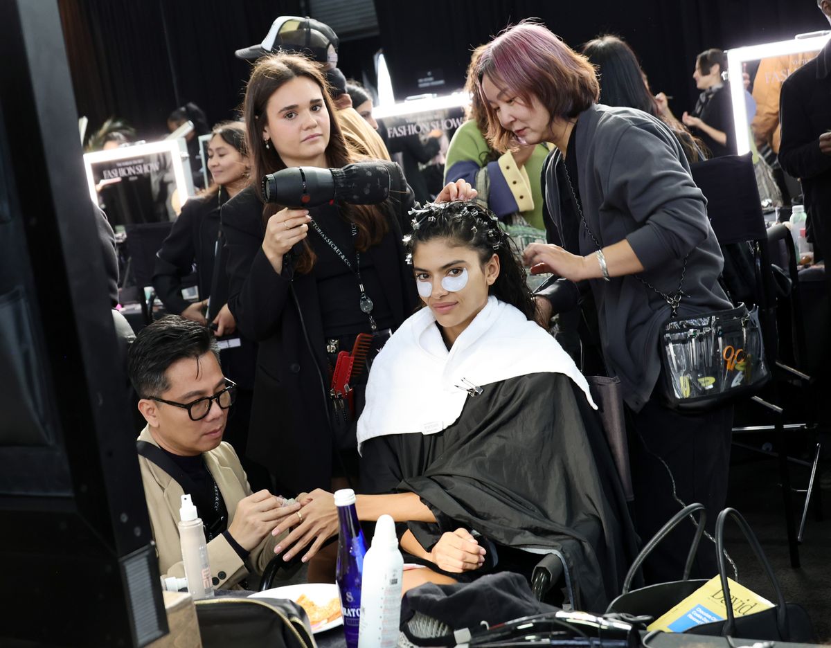 Rania Benchegra prepares backstage at the Victoria's Secret Fashion Show 2024 on October 15, 2024, in New York City. (Photo by Arturo Holmes/Getty Images for Victoria's Secret)