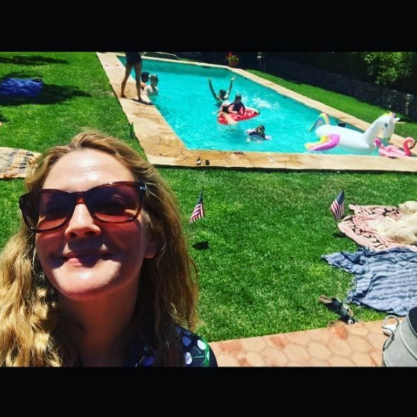 <b>Drew Barrymore</B>
Drew and her daughters were getting along swimmingly at this pool party with pals. Sharing a selfie with a glimpse at a number of people playing on floats in a swimming pool behind her, Drew simply wrote: "Happy fourth".
Photo: Instagram/@drewbarrymore