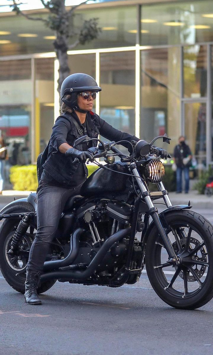 Halle Berry on a bike