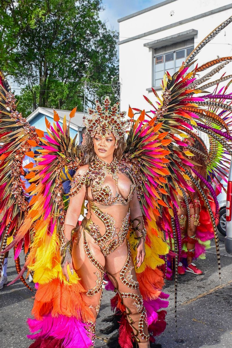 Singer Rihanna Stuns at Carnival Festival In Barbados As She Poses With Police Officers In Her 2024 Outfit Consisting of Bewejeled Bra Head- To-Toe.