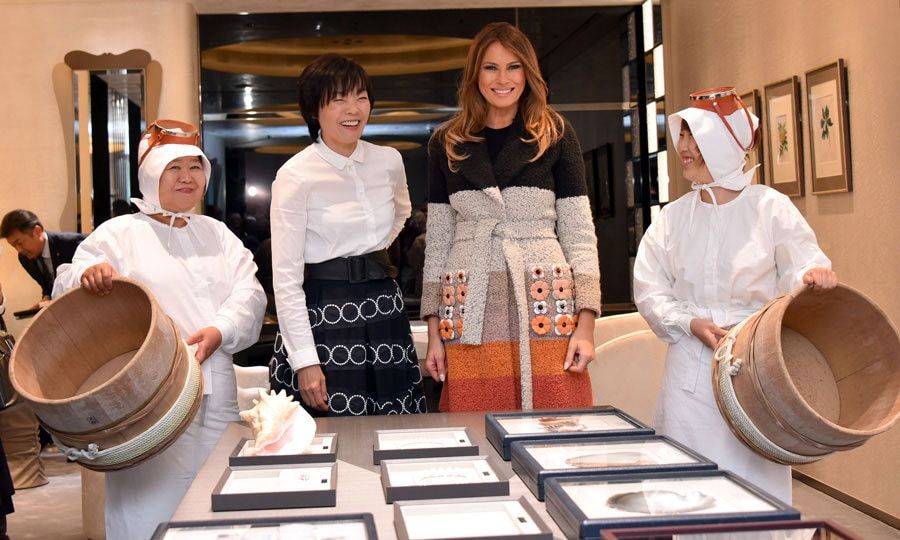 Donald and Melania kicked off the first leg of their tour arriving at Tokyo's Yokota Air Base on November 5. The first lady wowed in a $4,800 striped coat by Fendi that featured applique detailing.
Photo: KAZUHIRO NOGI/AFP/Getty Images