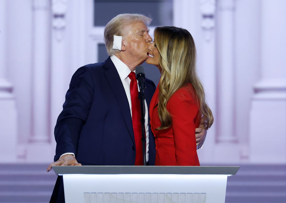 MILWAUKEE, WISCONSIN - JULY 18: Republican presidential nominee, former U.S. President Donald Trump kisses former first lady Melania Trump after officially accepting the Republican presidential nomination on stage on the fourth day of the Republican National Convention at the Fiserv Forum on July 18, 2024 in Milwaukee, Wisconsin. Delegates, politicians, and the Republican faithful are in Milwaukee for the annual convention, concluding with former President Donald Trump accepting his party's presidential nomination. The RNC takes place from July 15-18. (Photo by Chip Somodevilla/Getty Images)