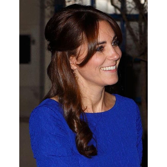 Heading to the Fostering Excellence Awards, Kate turned heads as she chose to wear her hair in a half updo reminding us of her wedding day hairstyle! Prince George's mother opted for one of the season's biggest trends with shimmering eyeshadow for an extra touch of evening glam.
<br>Photo: Getty Images