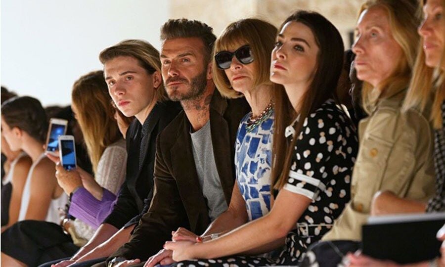 David and Brooklyn Beckham supported wife and mom Victoria Beckham at her Spring Summer 2017 presentation.
Photo: TREVOR COLLENS/AFP/Getty Images