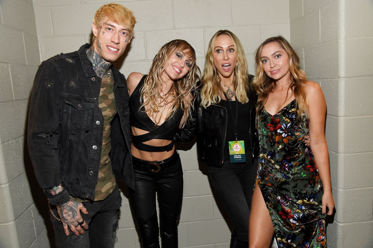 Trace Cyrus, Miley Cyrus, Tish Cyrus, and Brandi Cyrus pose backstage during the 2019 iHeartRadio Music Festival