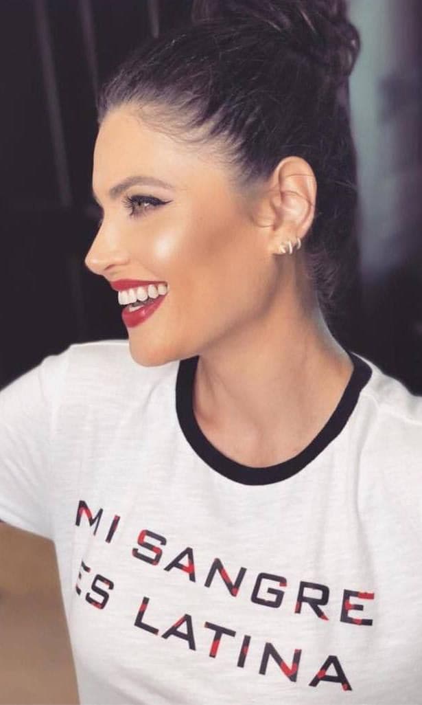Chiquinquira Delgado with makeup featuring raspberry-red lips