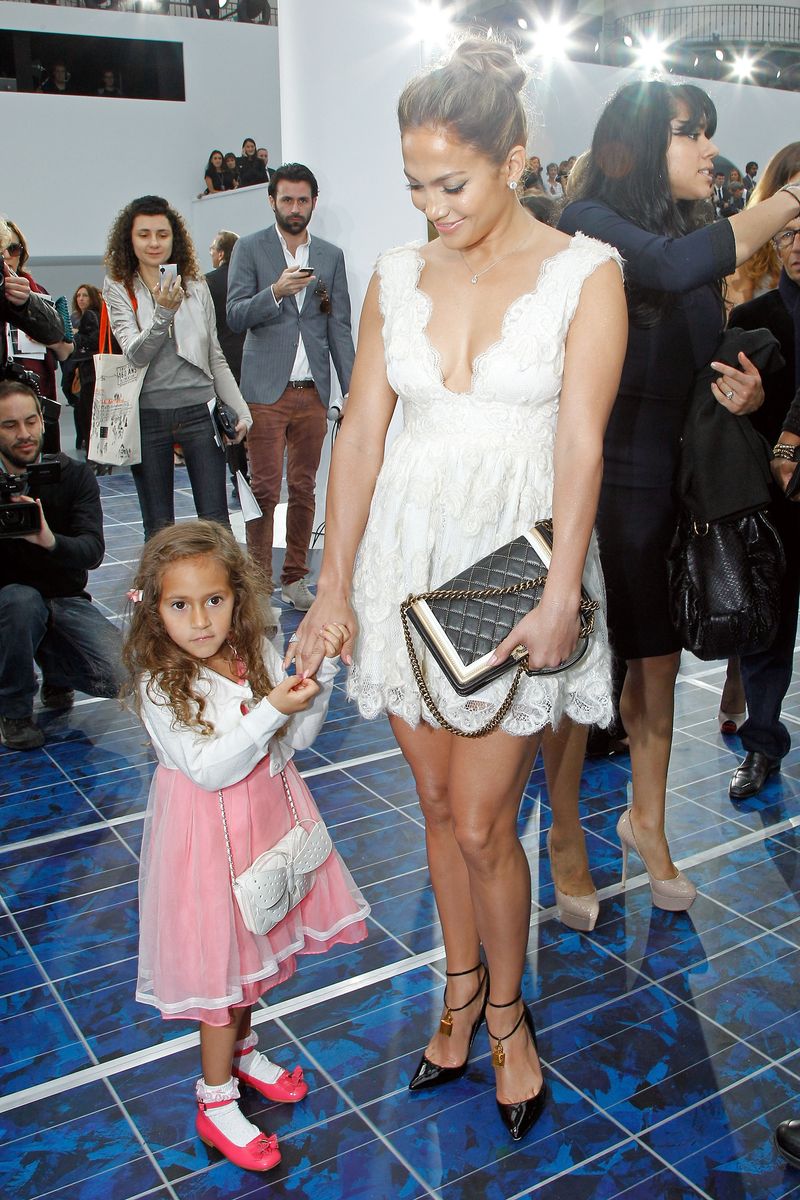 PARIS, FRANCE - OCTOBER 02:  Jennifer Lopez (R) and her daughter Emme Maribel Muniz attend the Chanel Spring / Summer 2013 show as part of Paris Fashion Week at Grand Palais on October 2, 2012 in Paris, France.  (Photo by Bertrand Rindoff Petroff/Getty Images)