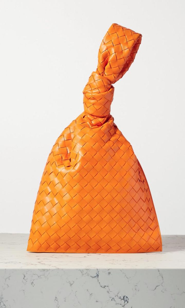 BV Twist Knotted model maxi clutch in orange from Bottega Veneta