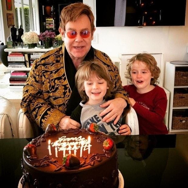 The Grammy-winner gave fans a look at his family's private birthday celebration ahead of the big gala. Elton shared an Instagram of him and his sons, Elijah and Zachary, at their home, eying a delicious looking cake. The singer wrote, "Birthday bliss."
Photo: Instagram/@eltonjohn