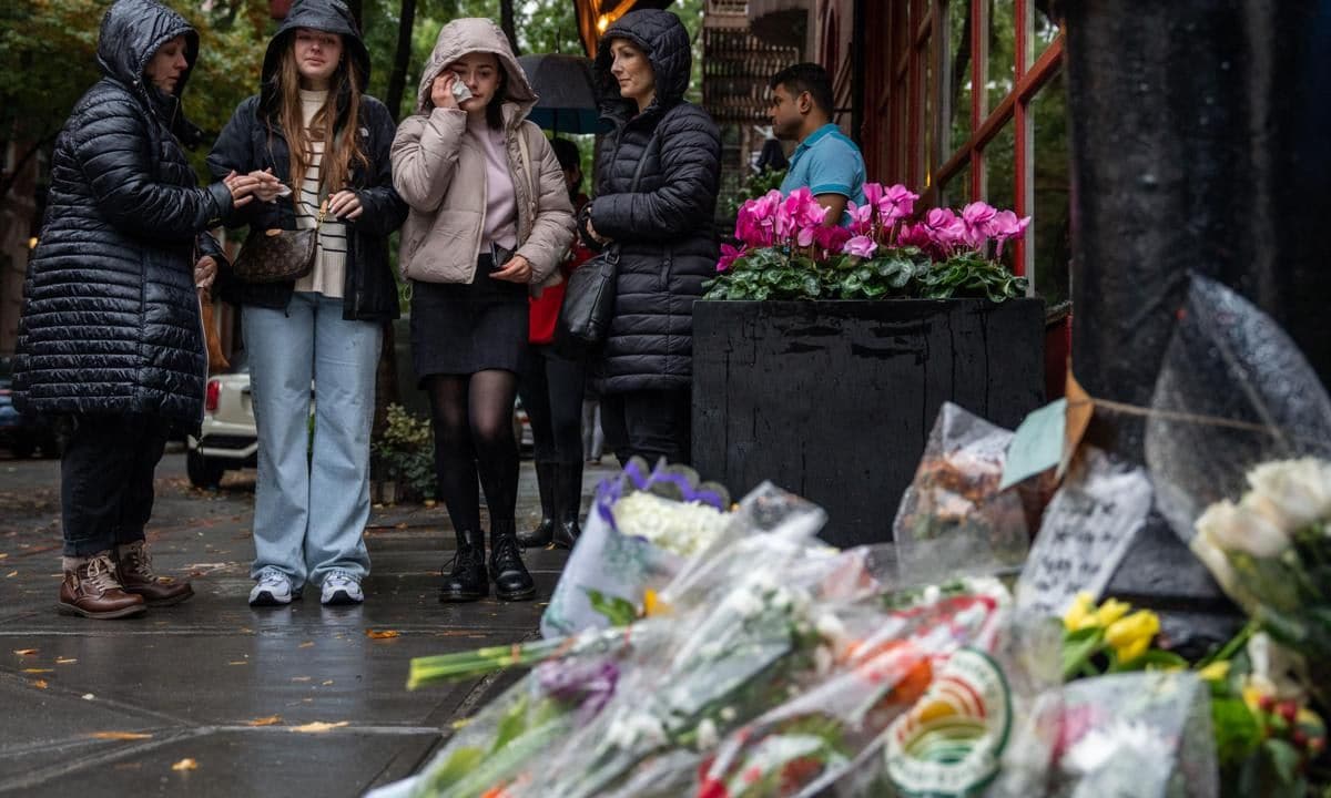 Young fans of Matthew Perry show their sadness in front of some of the famous sitcom locations in New York