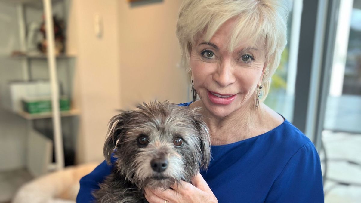 Isabel Allende with her dog Perla, the inspiration for her book, Perla The Mighty Dog