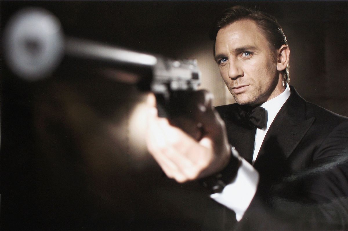 Daniel Craig poses as James Bond.  Craig was unveiled as legendary British secret agent James Bond 007 in the 21st Bond film Casino Royale, at HMS President, St Katharine's Way on October 14, 2005 in London, England.  (Photo by Greg Williams/Eon Productions via Getty Images)