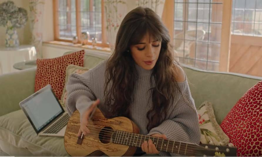 Camila Cabello, plays guitar