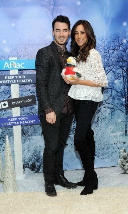 December 19: New parents Kevin and Danielle Jonas helped fulfill holiday wishes for families impacted by medical events through the #AflacHolidayHelpers program in NYC.
Photo: Diane Bondareff AP/Invision