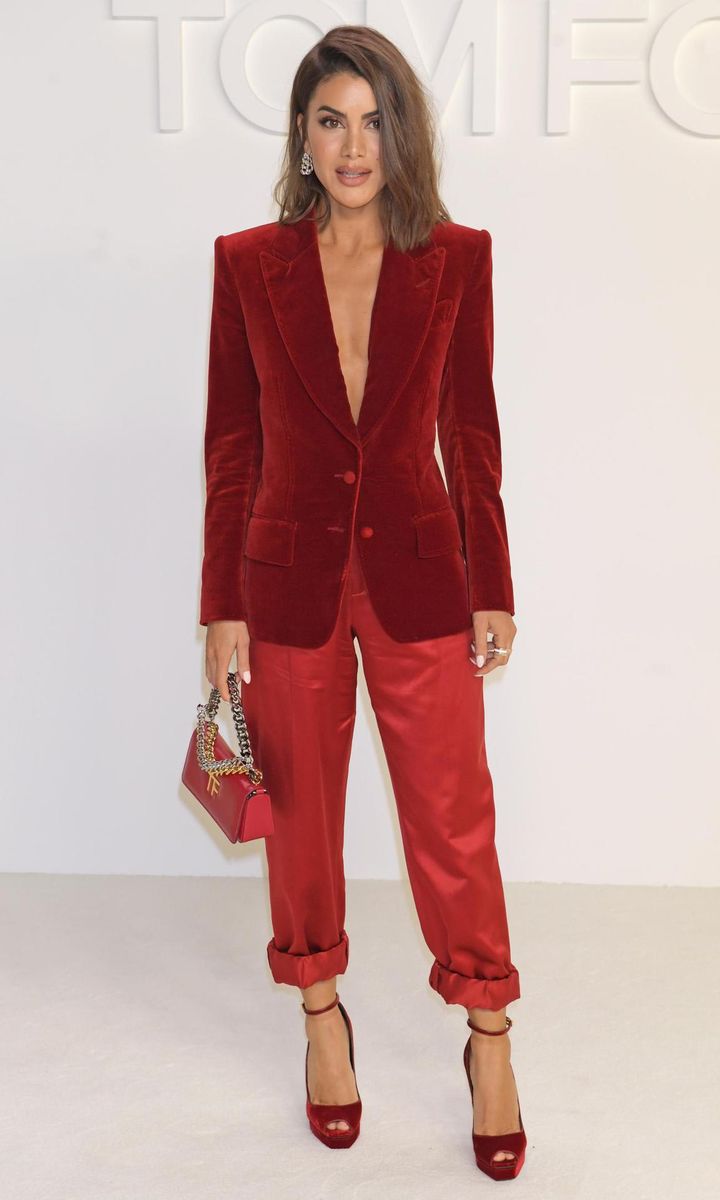 Camila Coelho with a tailored red suit by Tom Ford