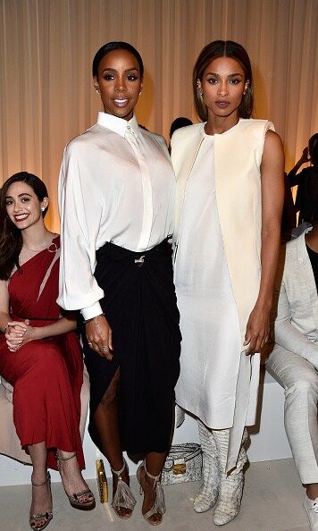 Emmy Rossum photobombed Kelly Rowland and Ciara while sitting front row at Lanvin.
<br>
Photo: Getty Images