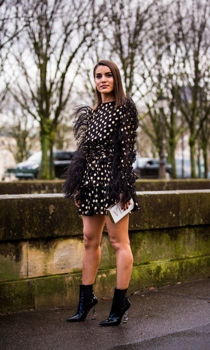 Fashion blogger Camila Coelho made Paris' scenery her backdrop for the perfect photo opp. The Brazilian beauty wore a polka dot mini dress with booties to the Valentino show.
Photo: Getty Images