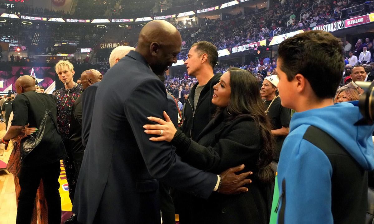 Vanessa Bryant and Michael Jordan hug at NBA All-Star game