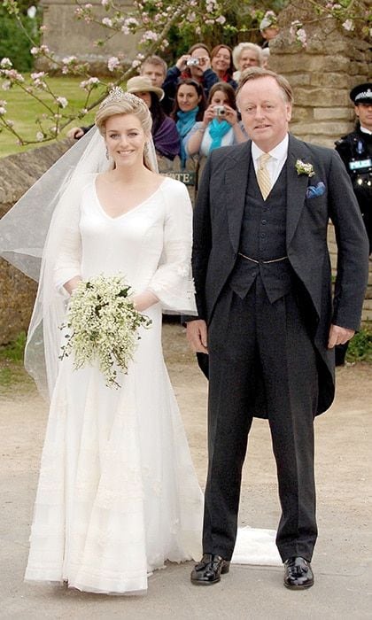 The bride arrived with her father Andrew Parker Bowles, who divorced Duchess Camilla in 1995, in a blue Bentley before he walked his daughter down the aisle.
Photo: Getty Images