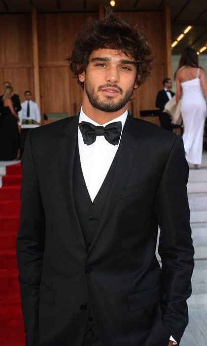 <b>Name:</b> Marlon Teixeira
<br><b>Height:</b> 6'2"
<br><b>Brands he's modeled for:</b> Dolce & Gabbana, DSquared2, Roberto Cavalli
<br><b>Fun fact:</b> His Instagram profile includes the quote: "Cool can be weird sometimes, but it's never weird to be yourself."
<br>
<br>
Photo: Getty Images